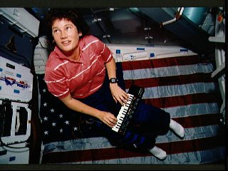 Keyboard maestro Susan Helms brings music to the middeck of the Earth-circling Endeavour during STS-54. Photo Credit: NASA