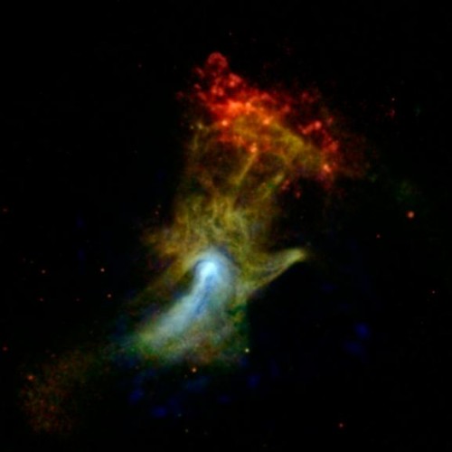 Nicknamed the "Hand of God," this object is called a pulsar wind nebula. It's powered by the leftover, dense core of a star that blew up in a supernova explosion. The pulsar itself can't be seen in this picture, but is located near the bright white spot. Image Credit: NASA/JPL-Caltech/McGill