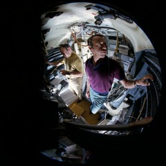 Al Shepard (foreground) and Ed Mitchell, pictured in the Lunar Module (LM) simulator during training. Photo Credit: NASA