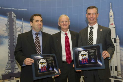 Patrick Hull, left, and Brent Gaddes, right, receive special commendation awards for their work on critical flight hardware for the Orion spacecraft's first mission later this fall. John Casper, center, Orion special assistant for program integration and a former astronaut, presented the awards at an Orion flight hardware celebration at the Marshall Center. Image credit: NASA/MSFC/Emmett Given 