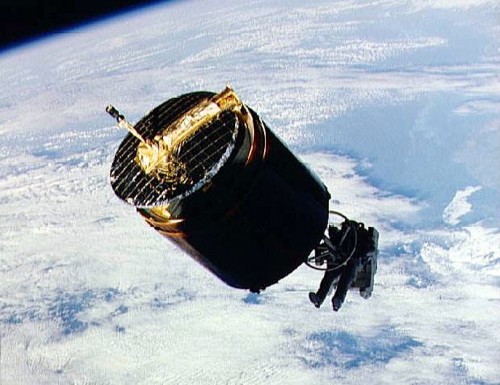 Equipped with a stinger mechanism on the arms of his MMU, Dale Gardner carefully approaches Westar-6 for retrieval. Photo Credit: NASA
