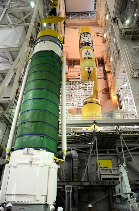 One of the Solid Rocket Boosters (SRBs) is readied for attachment to the central core of the H-IIA rocket, ahead of the GPM Core Observatory mission. Photo Credit: Mitsubishi Heavy Industries