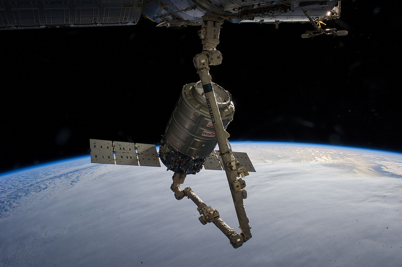 Grappled by Canadarm2, the ORB-1 Cygnus craft is readied for berthing at the nadir port of the Harmony node in 12 January. Tomorrow, it will be unberthed to begin the final stage of its mission. Photo Credit: NASA
