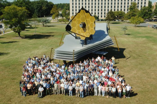 The full-scale model was assembled on the lawn at Goddard Space Flight Center, and displayed during September 19 - 25 2005. The Webb Telescope team took a group photo with it. Seeing the people gathered next to it shows its scale nicely. Credit: NASA