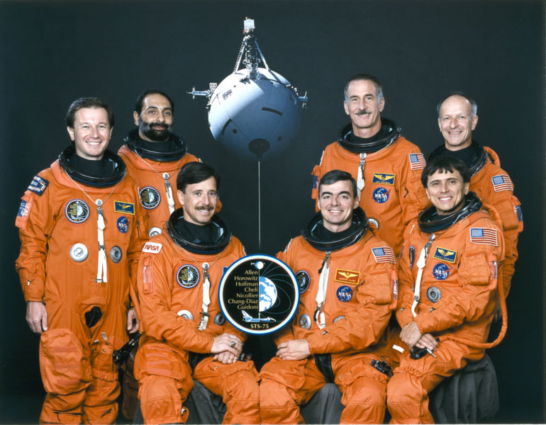 The STS-75 crew pose for their official portrait. Seated are Pilot Scott "Doc" Horowitz, Commander Andy Allen and Payload Commander Franklin Chang-Diaz, with Maurizo Cheli, Umberto Guidoni, Jeff Hoffman and Claude Nicollier standing. Photo Credit: NASA
