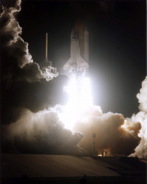 Discovery and her seven-man crew roar into the night on 11 February 1997. Photo Credit: NASA
