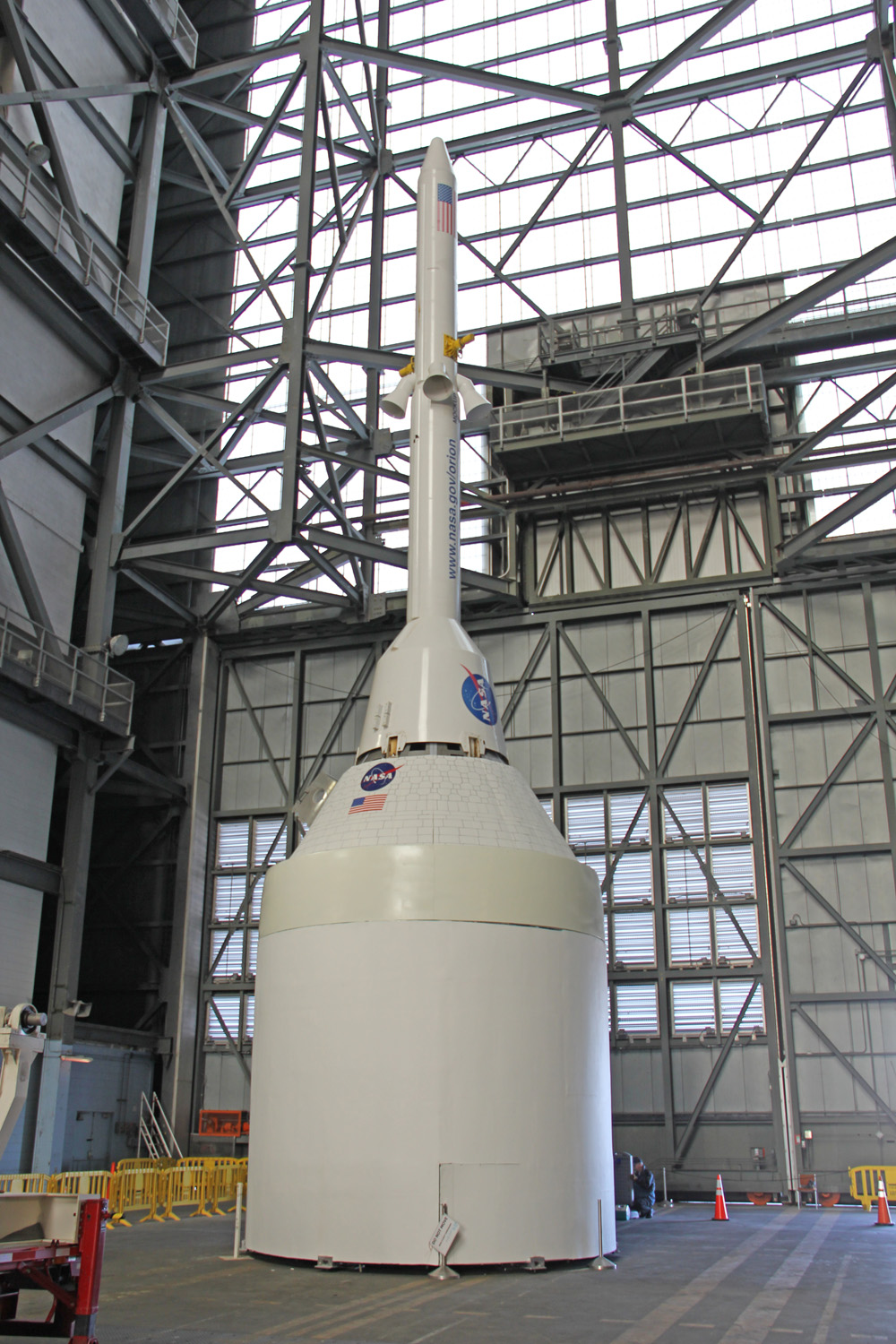 Orion crew capsule, Service Module and 6 ton Launch Abort System (LAS) mock up stack inside the transfer aisle of the Vehicle Assembly Building (VAB) at the Kennedy Space Center (KSC) in Florida.  Service module at bottom.  Technicians conducted stacking exercises to prepare for EFT-1 stacking.  Credit: Ken Kremer/kenkremer.com