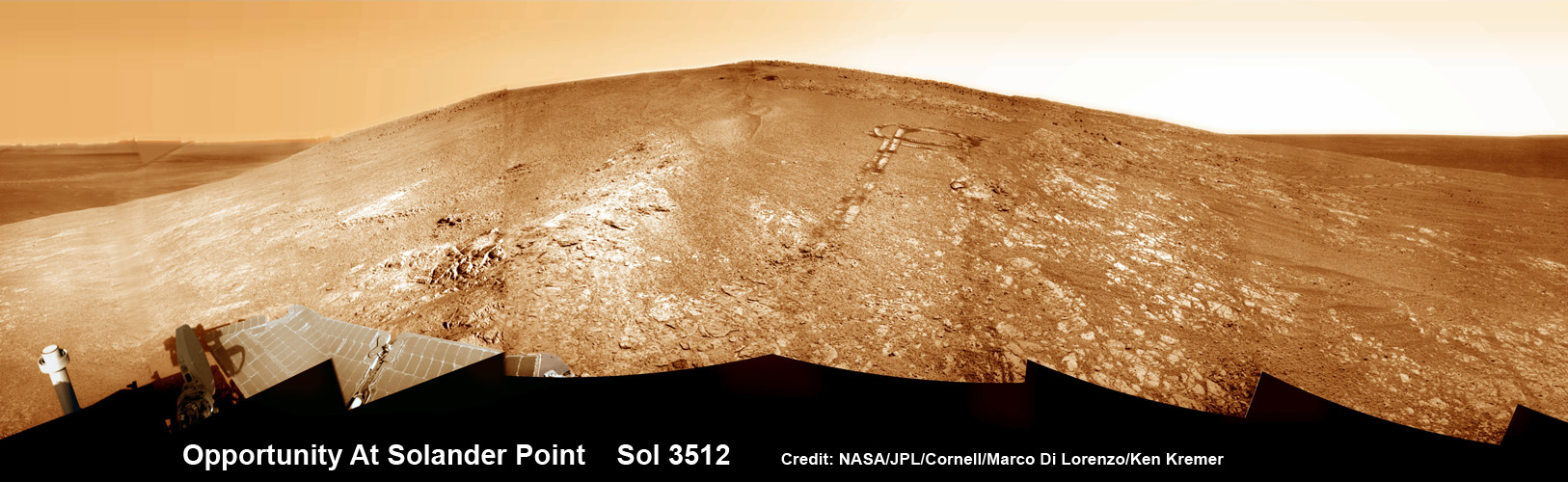Opportunity by Solander Point peak—2nd Mars Decade Starts here! NASA’s Opportunity rover captured this panoramic mosaic on Dec. 10, 2013 (Sol 3512) near the summit of “Solander Point” on the western rim of Endeavour Crater where she starts Decade 2 on the Red Planet. She is currently investigating outcrops of potential clay minerals formed in liquid water on her 1st mountain climbing adventure. Assembled from Sol 3512 navcam raw images. Credit: NASA/JPL/Cornell/Marco Di Lorenzo/Ken Kremer-kenkremer.com