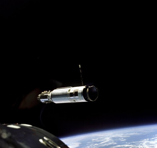 Gemini VIII (foreground) enters into the final stages of rendezvous with the Agena target vehicle. Photo Credit: NASA