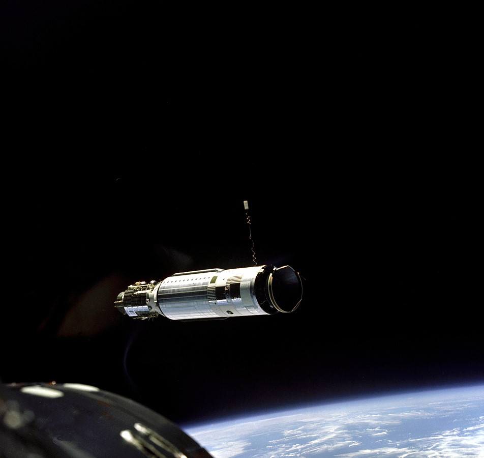 Gemini VIII (foreground) enters into the final stages of rendezvous with the Agena target vehicle. Photo Credit: NASA
