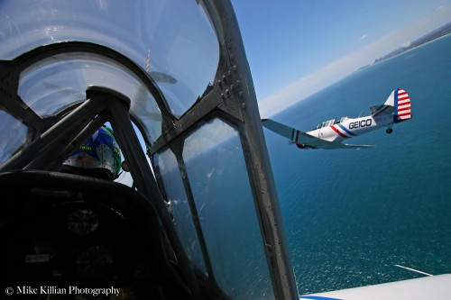 Formation flying in the slot position with the GEICO Skytypers, one of the headline acts for the 2014 Sun N' Fun Air Show this week. Photo Credit: AmericaSpace / Mike Killian