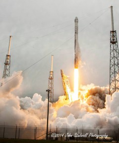 The SpaceX Falcon-9 v1.1 rocket launching the company's unmanned Dragon capsule on the company's CRS-3 for NASA in April 2014. Photo Credit: John Studwell/AmericaSpace