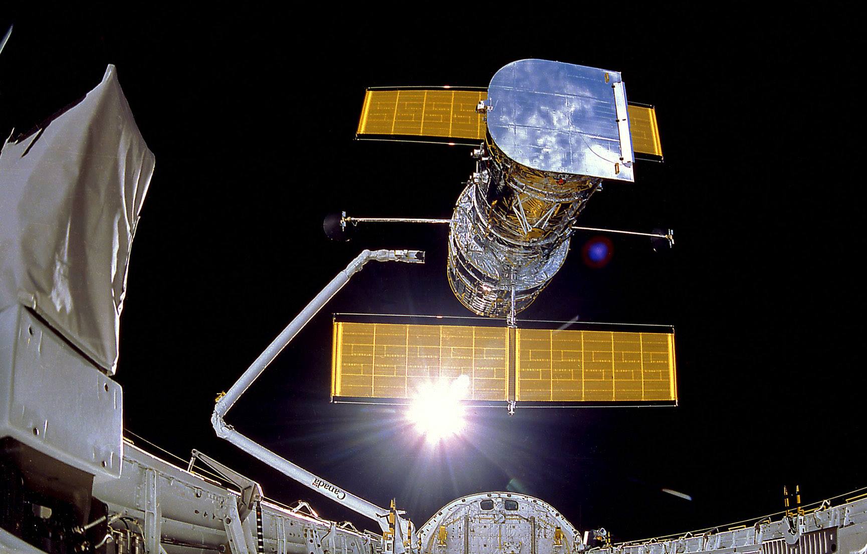 The moment of deployment of the Hubble Space Telescope (HST), as seen from the IMAX Cargo Bay Camera (ICBC). Photo Credit: NASA