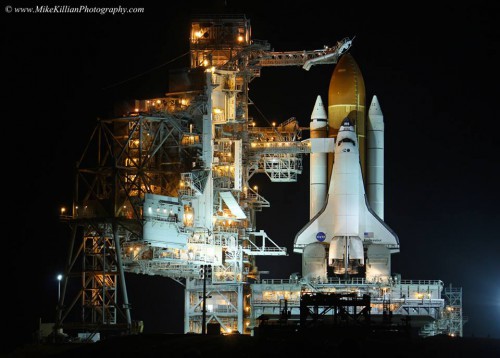 Space Shuttle Endeavour, OV-105, bathed in lights atop launch pad 39A at Kennedy Space Center the night before launching on her final mission in 2011 (STS-134). Photo Credit: Mike Killian
