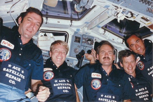 Declaring themselves the "Ace Satellite Repair Company", the five men of Mission 41C celebrate their success. From the left are Dick Scobee, George "Pinky" Nelson, James "Ox" van Hoften, Terry Hart and Bob Crippen. Photo Credit: SpaceFacts.de