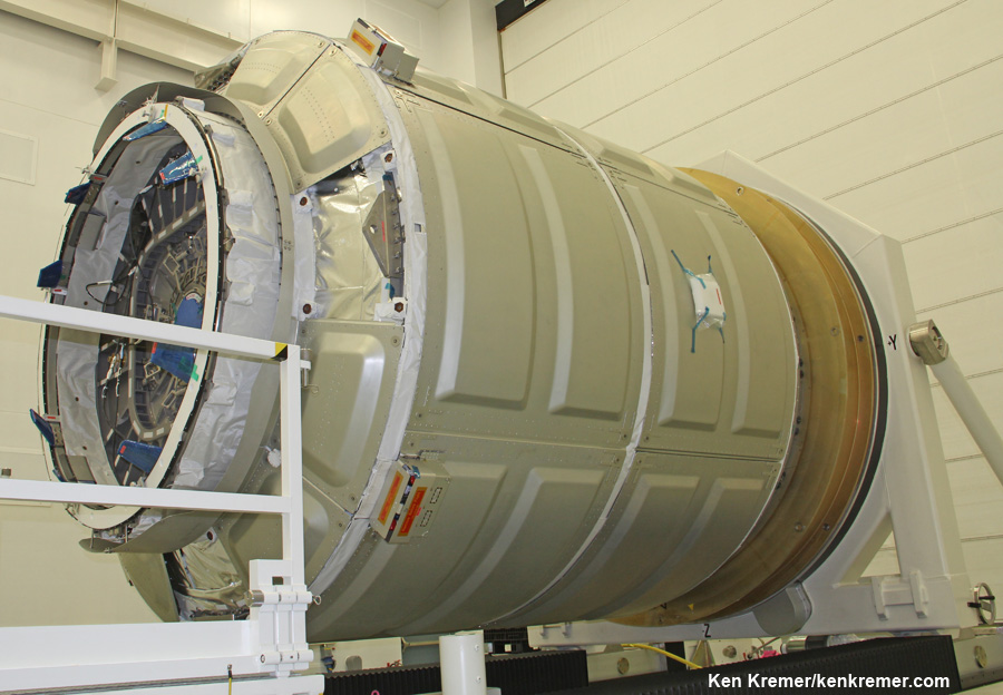 Cygnus Orb-1 pressurized cargo module – side view – during prelaunch processing by Orbital Sciences at NASA Wallops, VA. observed during exclusive visit by Ken Kremer.  Cygnus Orb-2 module will be loaded with 1650 kilograms of cargo.  Credit: Ken Kremer – kenkremer.com