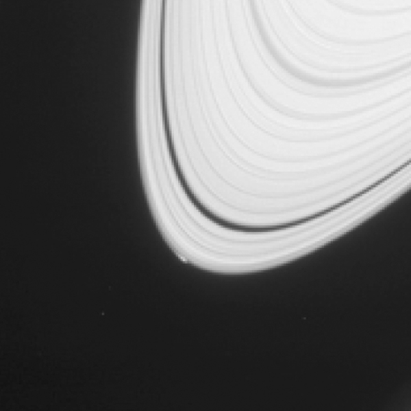 From NASA/JPL: "The disturbance visible at the outer edge of Saturn's A ring in this image from NASA's Cassini spacecraft could be caused by an object replaying the birth process of icy moons." Image Credit: NASA/JPL-Caltech/Space Science Institute