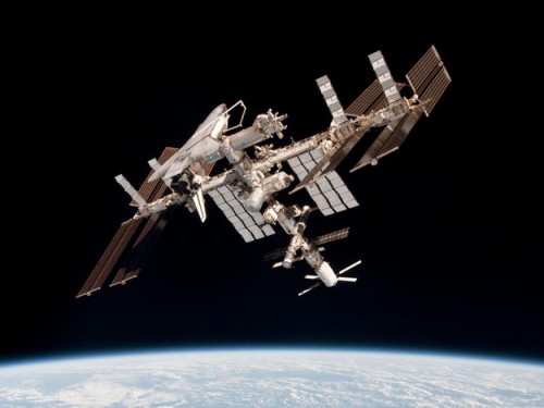 The International Space Station with the docked ESA ATV Johannes Kepler and Space Shuttle Endeavour. Shot taken by ESA astronaut Paolo Nespoli from Soyuz TMA-20 following its undocking on 24 May 2011.