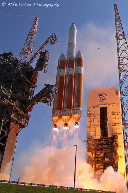 File photo of a ULA Delta-IV Heavy rocket launching a top-secret classified payload for the U.S. National Reconnaissance Office on June 29, 2012. Photo Credit: Mike Killian