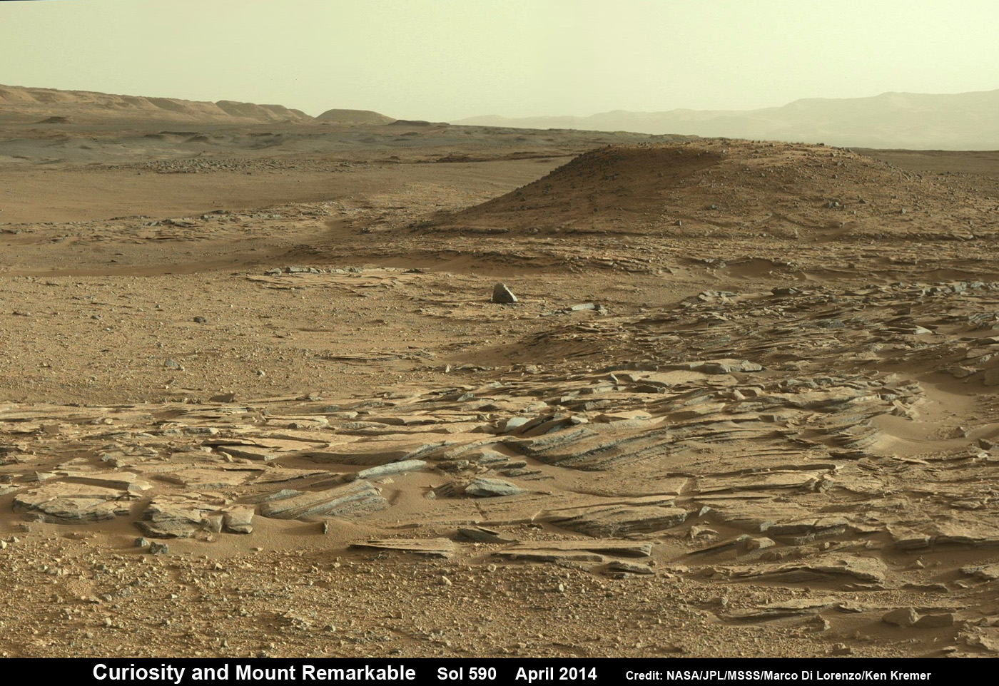 Curiosity scans scientifically intriguing rock outcrops of gorgeous Martian terrain at ‘The Kimberley’ waypoint in search of next drilling location beside Mount Remarkable butte, at right. Mastcam color photo mosaic assembled from raw images snapped on Sol 590, April 4, 2014. Credit: NASA/JPL/MSSS/Marco Di Lorenzo/Ken Kremer – kenkremer.com