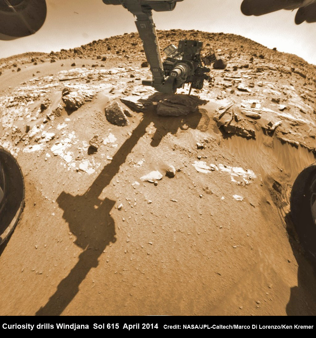 Hazcam fisheye camera image shows Curiosity drilling into “Windjama”  rock target  on April 29, 2014 (Sol 615).  Flattened and colorized image shows Mount Remarkable butte backdrop.  Credit: NASA/JPL/Marco Di Lorenzo/Ken Kremer - kenkremer.com 