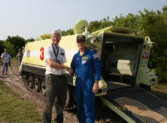 STS-135 Shuttle Commander Chris Ferguson (right) and Ken Kremer (AmericaSpace) meet at emergency M-113 Tank Practice during crew pre-launch events at the Kennedy Space Center in the weeks before Atlantis July 8, 2011 liftoff. Credit: Ken Kremer- kenkremer.com