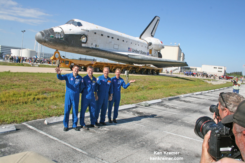 NASA’s final shuttle crew on STS-135 mission greets the media and shuttle workers during Atlantis rollover from the OPF-1 processing hanger to the VAB at KSC during May 2011.   From left: Rex Walheim, Shuttle Commander Christopher Ferguson, Douglas Hurley and Sandra Magnus. The all veteran crew delivered the Raffaello multipurpose logistics module (MPLM), science supplies, provisions and space parts to the International Space Station (ISS). Credit: Ken Kremer - kenkremer.com