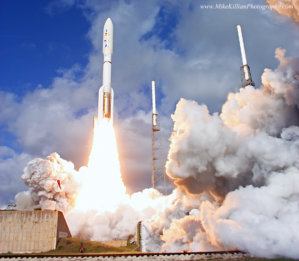 A ULA Atlas-V rocket launching NASA's Mars Science Laboratory / Curiosity rover on a 300-million mile trip to land on the Red Planet. As of April 30, ULA is temporarily banned under court order from purchasing the Russian-made engine to power the rocket into space. Photo Credit: Mike Killian