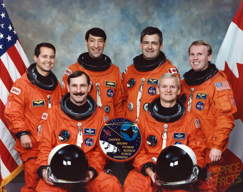 The STS-77 crew. Seated are John Casper (right) and Curt Brown (left), with Dan Bursch, Mario Runco, Marc Garneau and Andy Thomas standing. Photo Credit: NASA, via Joachim Becker/SpaceFacts.de