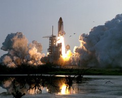 Discovery roars into orbit on 17 June 1985, beginning her fifth flight and the shuttle program's 18th mission. Photo Credit: NASA