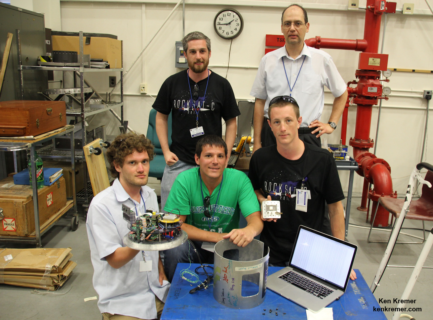 This RockSat-C team from West Virginia University, Morgantown measured Earth’s plasma density and rocket flight dynamics during the June 26, 2014 RockOn launch from NASA Wallops and is led by Dimitris Vassiliadis, Research Associate Professor (top right). Student members include Steven Hard, masters student,  Greg Lusk: electrical engineering,  Josh Hiett: applied physics,  Michael Lindon: plasma physics, Amy Sardone, physics (not shown).  Credit: Ken Kremer - kenkremer.com/AmericaSpace