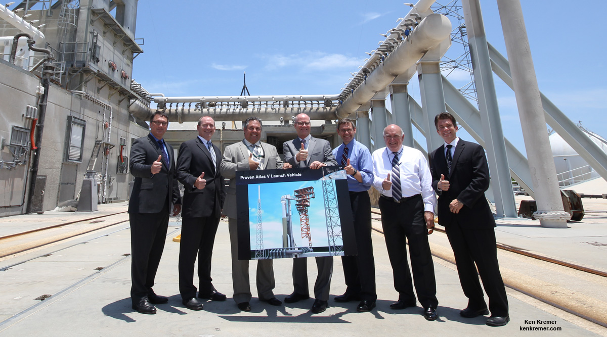ULA and Boeing executives posing atop Atlas V launch pad at Space Launch Complex 41 which will be modified to launch Boeing CST-100 spaceship to ISS - including Howard Biegler, ULA Human Spaceflight lead, 3rd from left, Dan Collins, ULA COO, John Elbon, Boeing VP Space Exploration, and Frank DelBello, Space Florida.  Credit: Ken Kremer - kenkremer.com