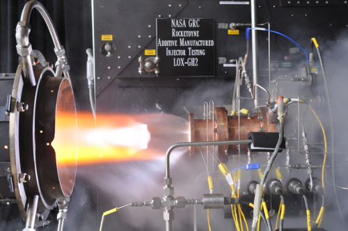 A hot fire test of a joint NASA/Aerojet Rocketdyne 3-D printed rocket engine injector, at the space agency's Glenn Research Center. Image Credit: at NASA/GRC