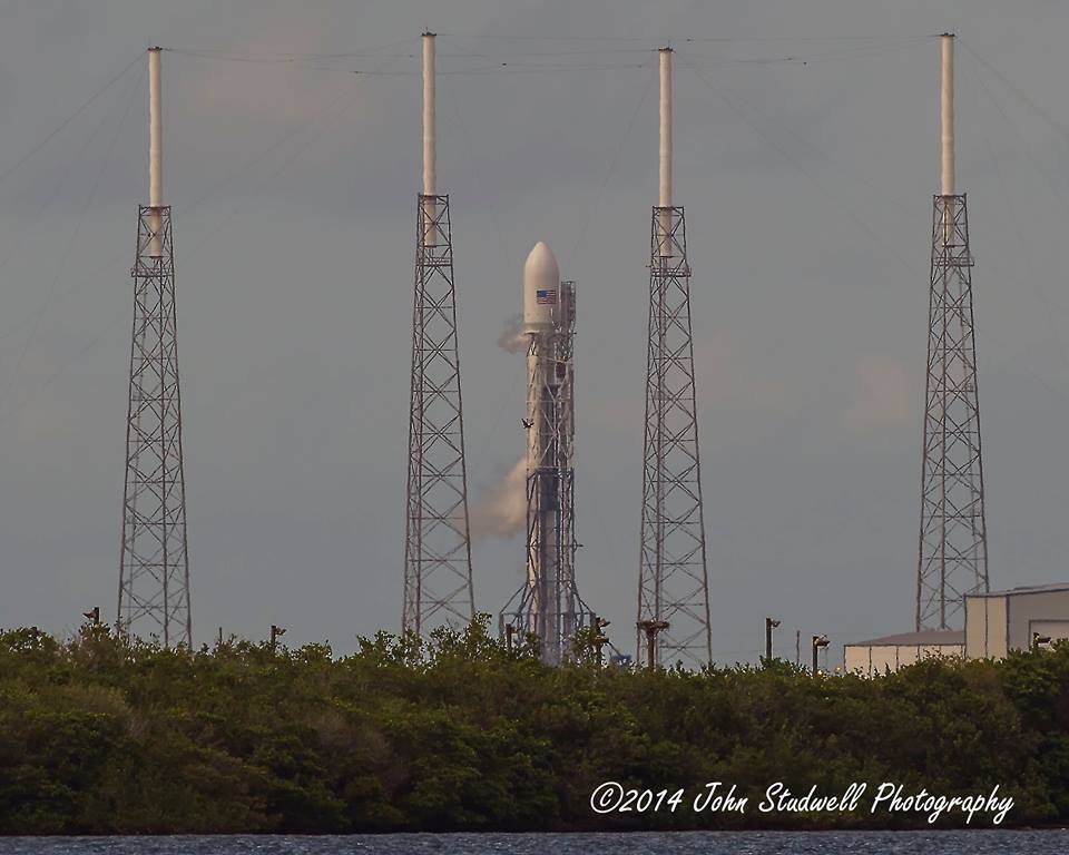 SpaceX's third Falcon 9 v1.1 mission of 2014 must wait a little longer, following Saturday's weather delay. Photo Credit: John Studwell
