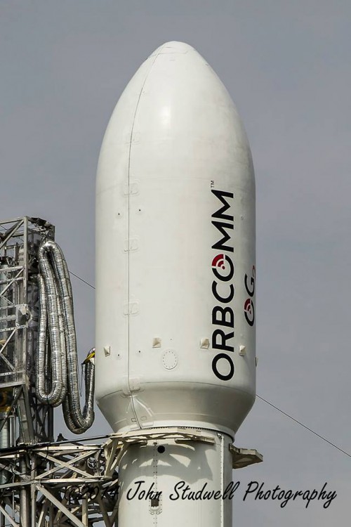 Within the Falcon 9 v1.1's bulbous payload fairing are six OG-2 satellites to be delivered into low-Earth orbit on behalf of Orbcomm, Inc. Photo Credit: John Studwell