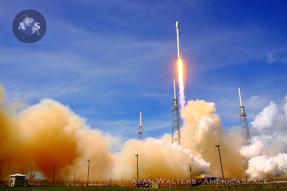 The SpaceX Falcon-9 v1.1 rocket ignites at Cape Canaveral Space Launch Complex-40 to deliver the first wave of a new fleet of ORBCOMM telecommunications satellites on Mon., July 14, 2014. Photo Credit: Alan Walters / AmericaSpace