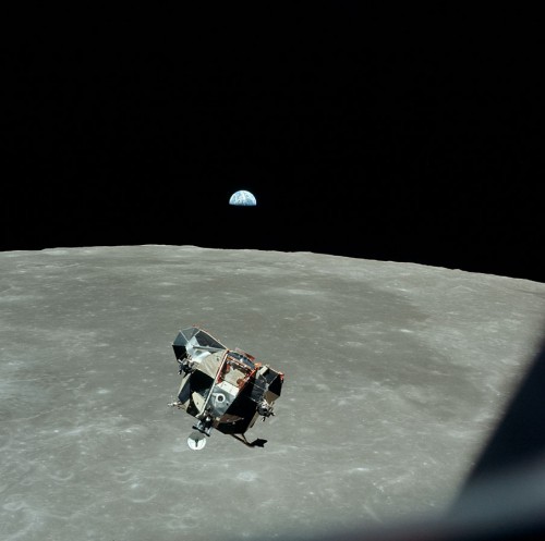 The ascent stage of the Lunar Module 'Eagle' returns to the Apollo 11 spacecraft in lunar orbit. All of humanity, except from Mike Collins who was holding the camera, can be seen in this picture. Image Credit: NASA