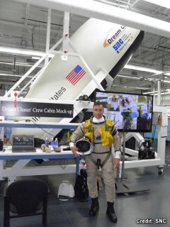Former astronaut Lee Archambault prepares for a Dream Chaser Crew Systems Test. Photo Credit: SNC