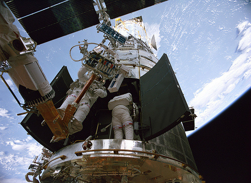 Massimino and Good working on Hubble on the STS-125 mission. Photo: NASA