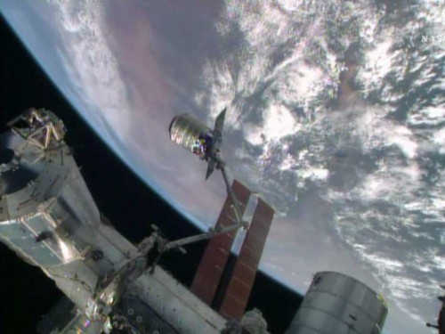 The ORB-2 Cygnus cargo craft is grappled by the space station's Canadarm2 robotic arm at 6:36 a.m. EDT Wednesday, 16 July. Photo Credit: NASA