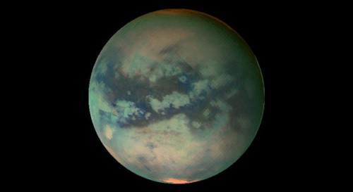 Titan is a bizarre world of methane seas, lakes, rivers and rain on its surface and a salty water ocean below. Image Credit: NASA/JPL-Caltech