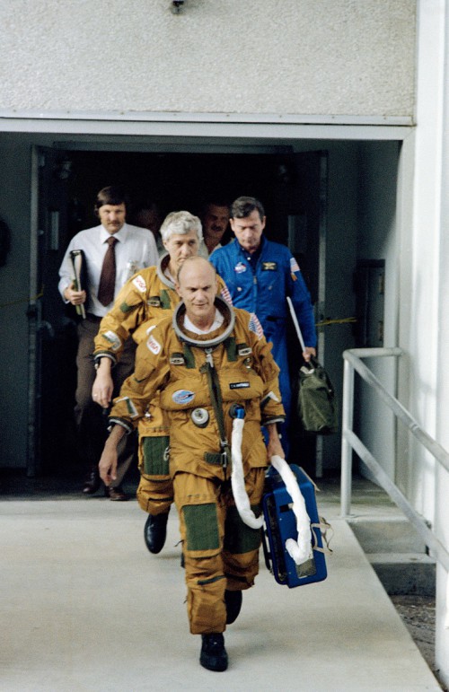 Ken Mattingly (foreground) and Hank Hartsfield depart the Operations & Checkout Building on their way to the launch pad. Photo Credit: Joachim Becker/SpaceFacts.de