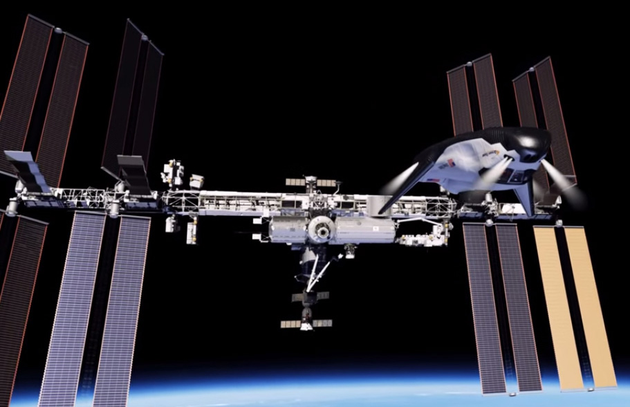 Global partnerships could one day lead to European or Japanese versions of the Dream Chaser docking at the ISS in this artists concept.  Credit: Sierra Nevada Corporation (SNC)
