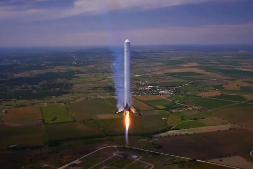 SpaceX's 3-engine F9R prototype is seen here during a flight test at the company's McGregor, Texas test site last May. Photo Credit: SpaceX