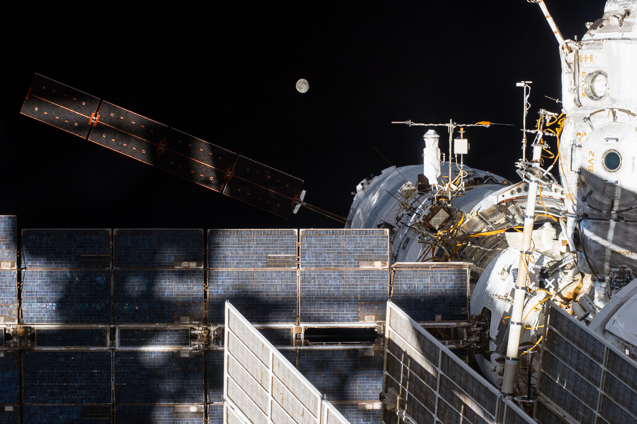 Characterized by its X-shaped "windmill" of solar arrays, Europe's fifth and final Automated Transfer Vehicle (ATV-5) is visible, attached to the aft longitudinal port of the International Space Station's (ISS) Zvezda module. Photo Credit: NASA