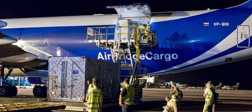 Crated in separate containers, the Galileo FOC-1 twins arrive in French Guiana on 7 May 2014. Photo Credit: Arianespace