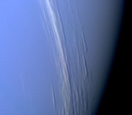 High-altitude clouds of Neptune, as seen by Voyager 2. Photo Credit: NASA