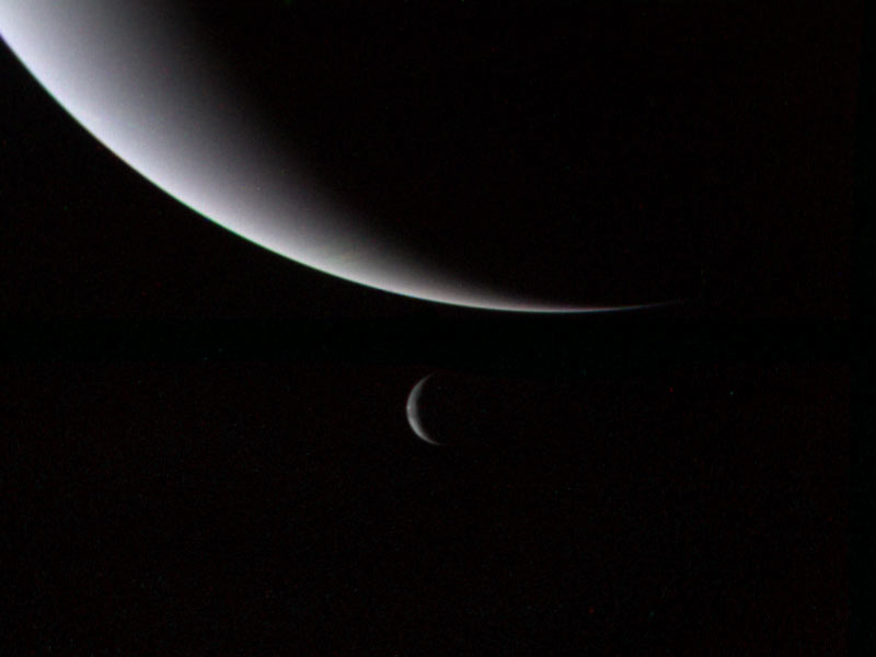Neptune and its large moon, Triton, as seen by Voyager 2, three days after closest approach. Ims Credit: NASA
