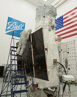 WorldView-3 undergoes testing of its electricity-generating solar arrays. Photo Credit: Ball Aerospace