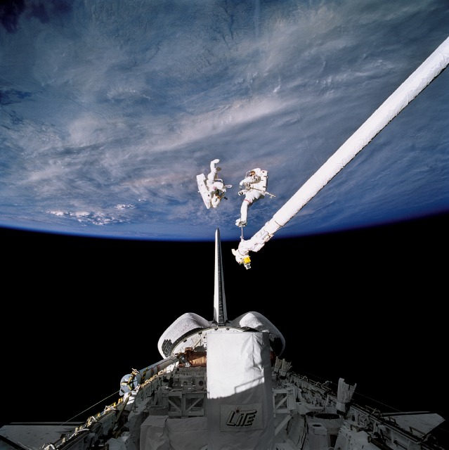 Carl Meade (left) and Mark Lee evaluate their ability to recover from tumbles during the EVA. Photo Credit: NASA